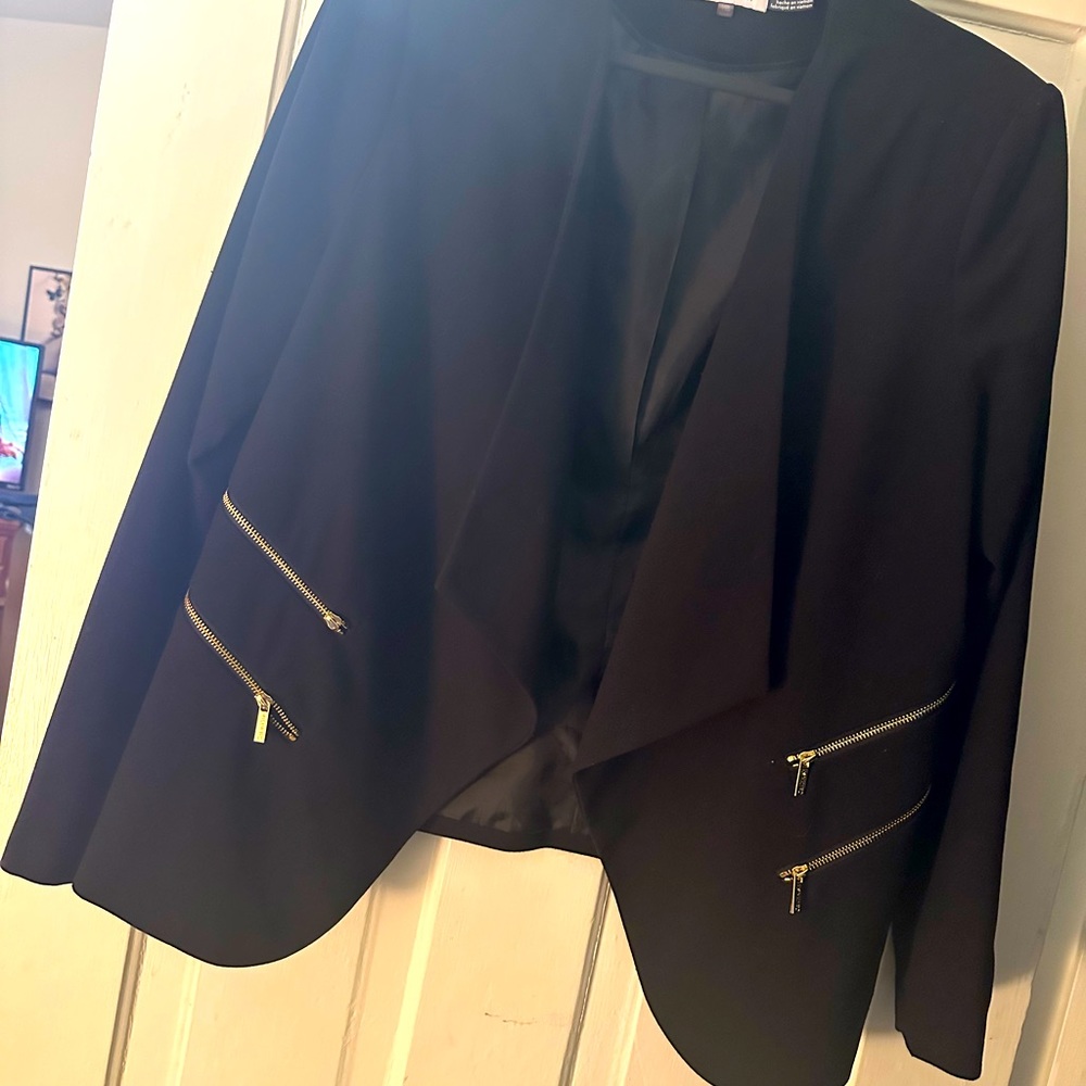 Calvin Klein zipper detail asymmetrical blazer. Black in color. Size 14